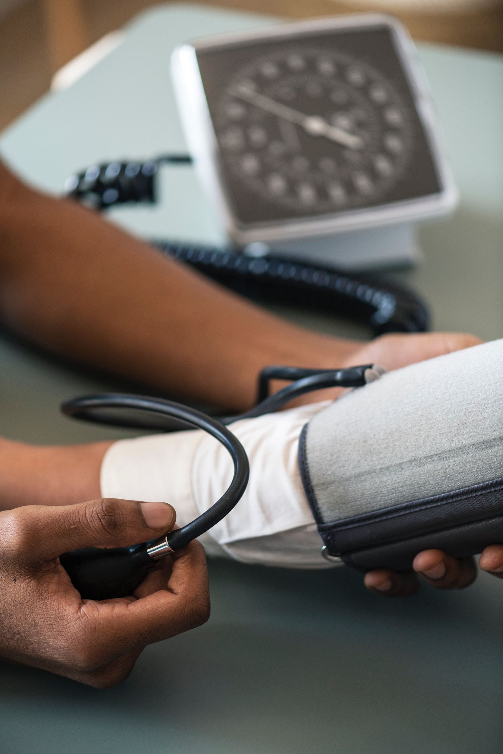 a person having their blood pressure taken